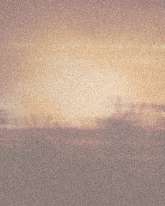 Stage lights in soft peach haze